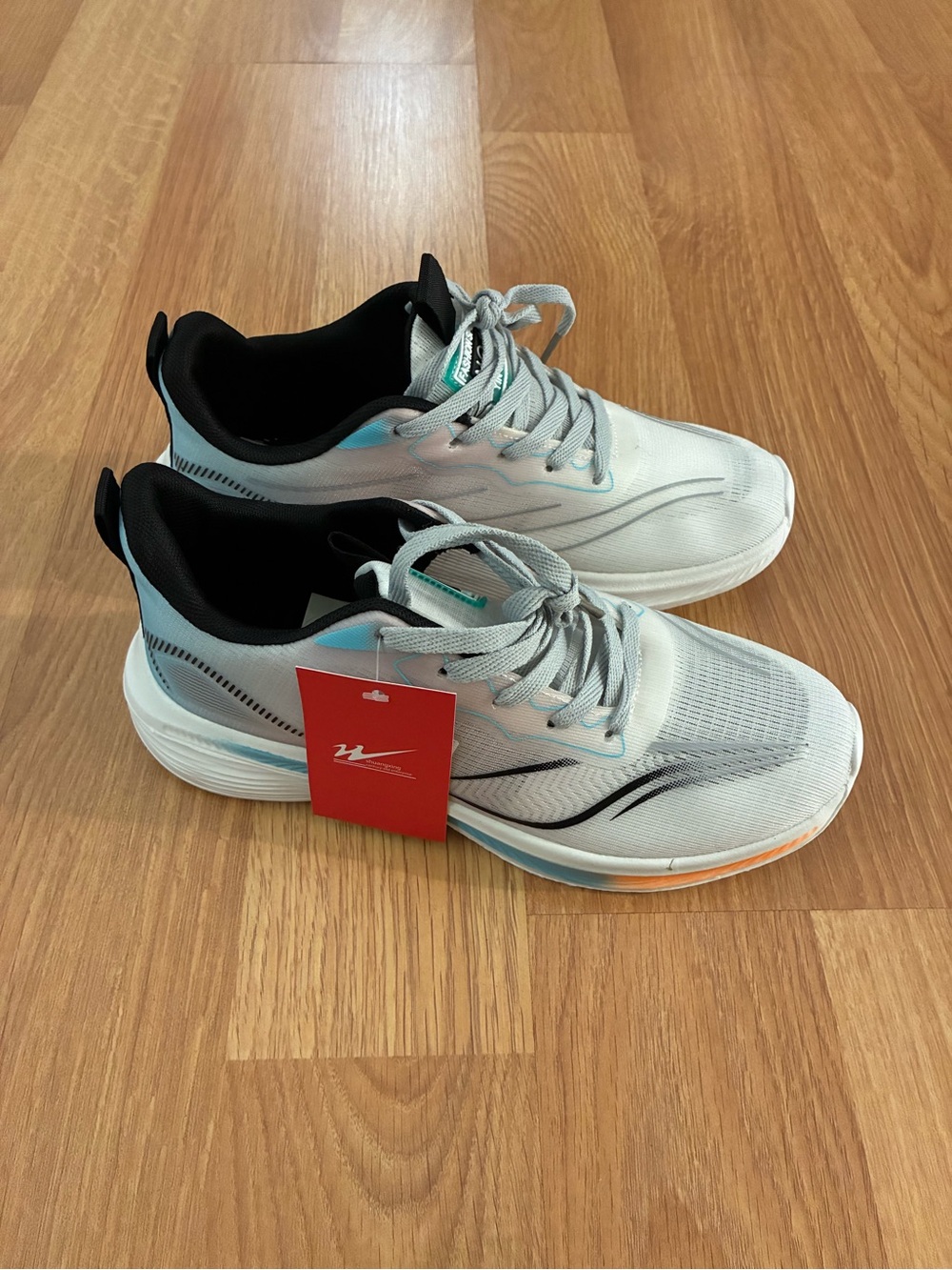Light Gray Athletic Sneakers with Black & Teal Accents